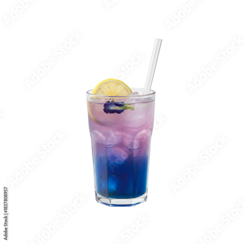 iced butterfly pea tea drink with ice and lemon in a glass