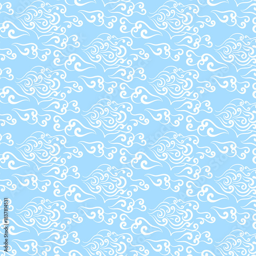 art pattern with white swirls on a blue background.