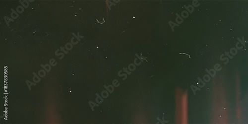 leak overlay effect with scratch dust and motion blur red light leaks,retro noisy film texture light leak flare on black background,abstract background with ray,grunge film strip background