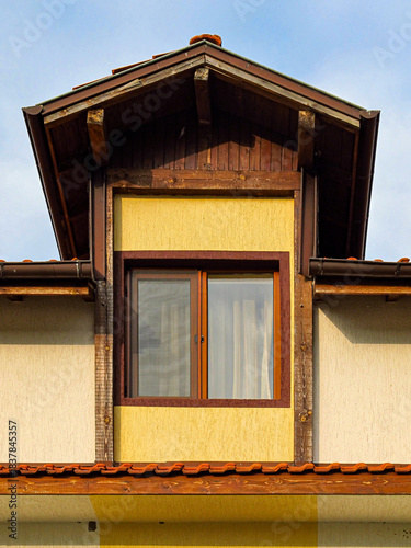 Small wooden window and roof