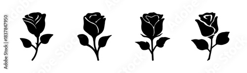 Set of four black rose silhouettes with stem and leaves, elegant floral icons