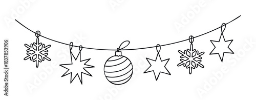 Christmas garland of snowflake and bauble ornaments hanging on a string for festive celebration and winter holiday decoration.