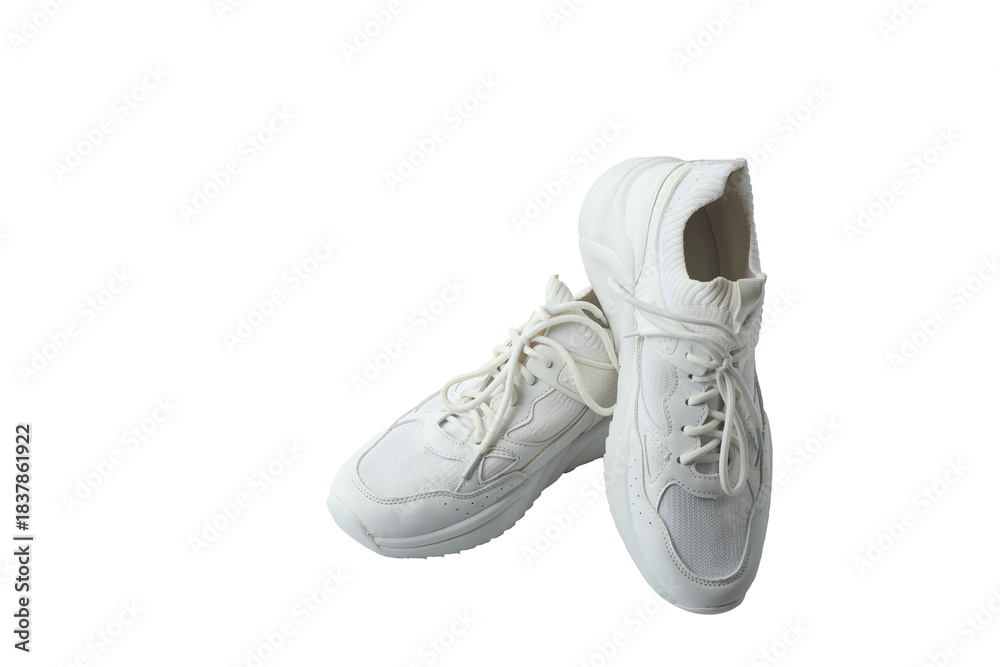 Fototapeta premium pair of white sneakers isolated
