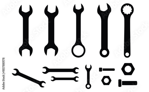 Essential collection of black silhouette hand tools including various wrenches spanners and fasteners perfect for maintenance and repair concepts