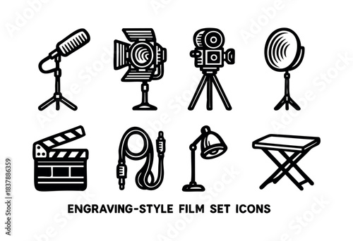 A set of engraving-style icons depicting film production equipment like a microphone, lights, camera, clapperboard, cables, and a table — stock vector.