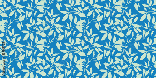Elegant seamless vector pattern with delicate botanical branches and soft leaves on a vivid blue background. Perfect for textiles, packaging, wallpapers and modern decorative designs