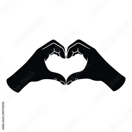 Hands forming a heart silhouette gesture