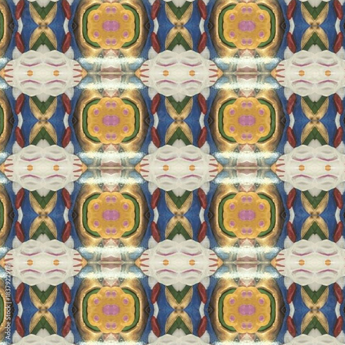 A richly colored kaleidoscope abstract pattern featuring mirrored flower-like shapes that create a vivid art texture background design.