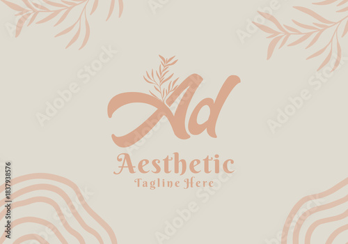 Brush style Ad initial letter logo with aesthetic leaf accents