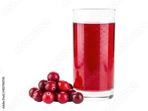 Isolated tall glass of refreshing red cranberry juice drink with pile of cranberries