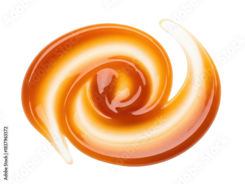 Fotografija Isolated swirl of glossy caramel sauce on a surface, topping or ingredient for d