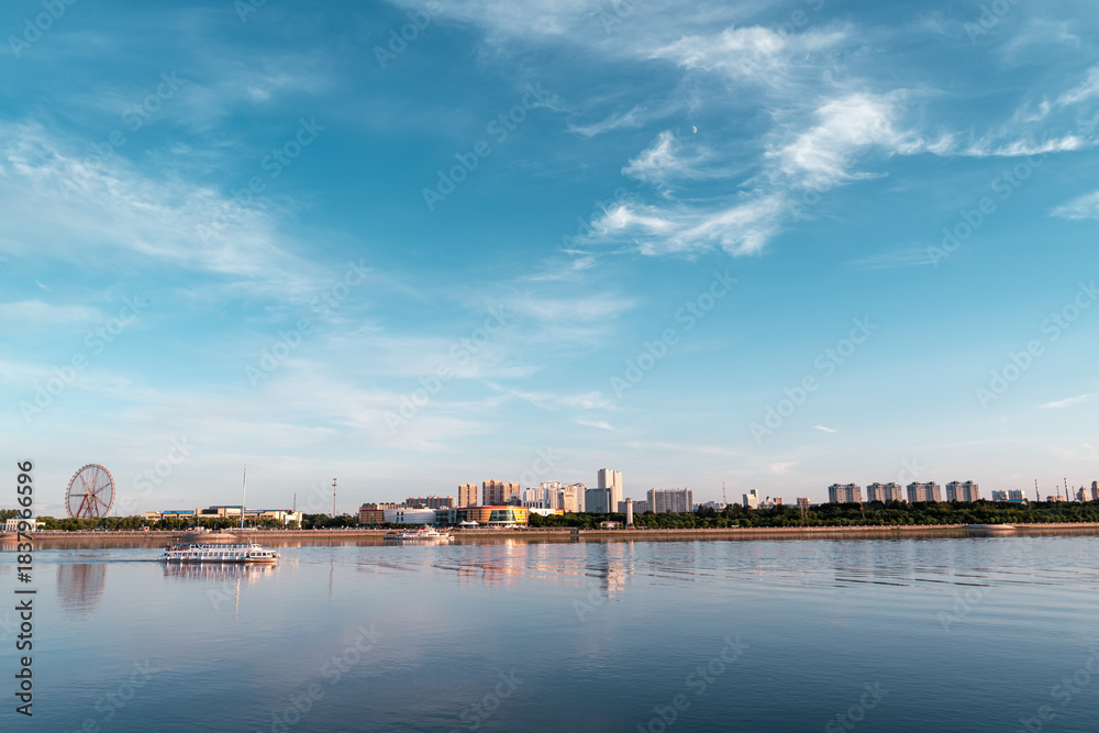Naklejka premium Riverside at sunset. Blagoveshchensk, Amur region, Russia
