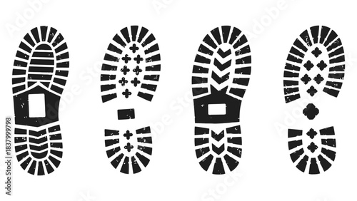 Four black boot prints in different designs isolated on white background