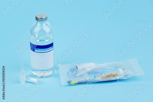 Wallpaper Mural IV drip system with bottle on blue background Torontodigital.ca