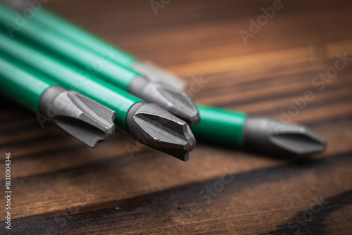 Wallpaper Mural Set of bits for a screwdriver on wooden background Torontodigital.ca