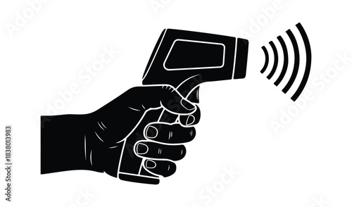 Hand holding infrared thermometer for temperature measurement