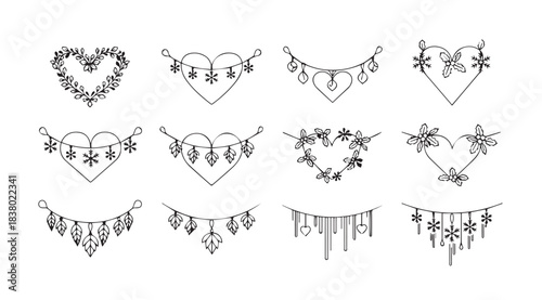 Collection of twelve ornate decorative heart shaped floral ornaments silhouette