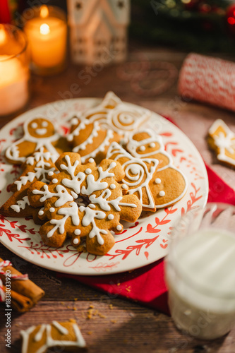 Holiday background. Christmas gingerbread cookies in different shapes in a plate
