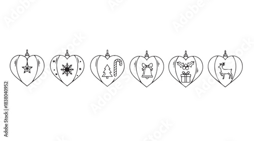 Collection of six decorative heart shaped ornaments with intricate designs silhouette