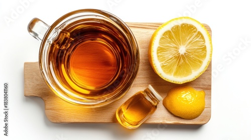Lemon tea ingredients on a wooden board.