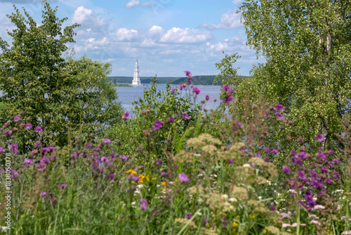 The flooded bell tower of St. Nicholas Cathedral rises above the surface of the Volga River. Kalyazin, Tver region