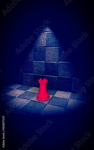 Chess pieces on a chessboard: Rook illuminated by a light from above, 3d rendering