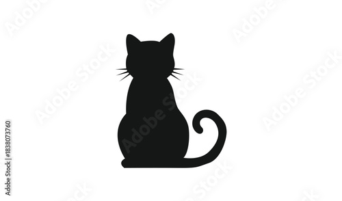 Black silhouette of a cat sitting with tail curled
