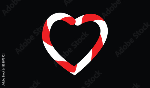 Heart shape made of red and white candy canes on a black background
