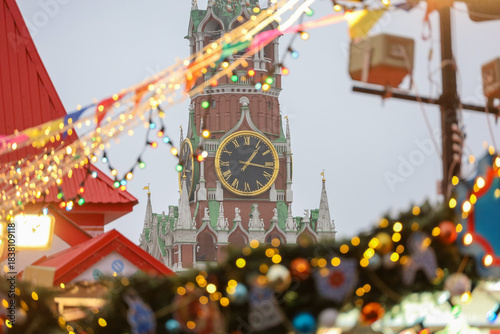 Christmas decorations on background of Moscow Kremlin on Red square, selective focus. New Year in Russia, view of the Spasskaya tower