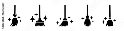 A collection of broom icons with sparkling effects, symbolizing cleaning and tidiness.