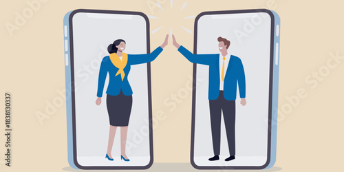 Virtual connection A man and woman giving each other a high five on smartphones