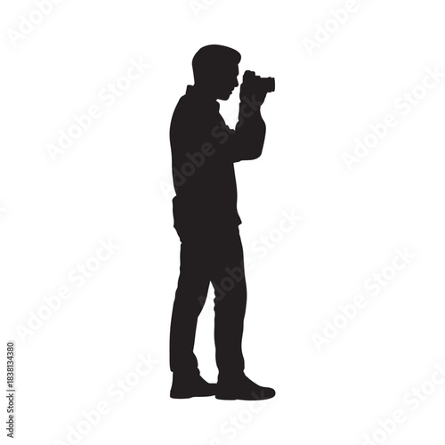 Silhouette of a photographer capturing a moment with their camera