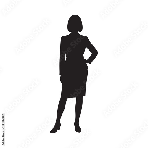 Silhouette of a woman in a business suit standing with poise