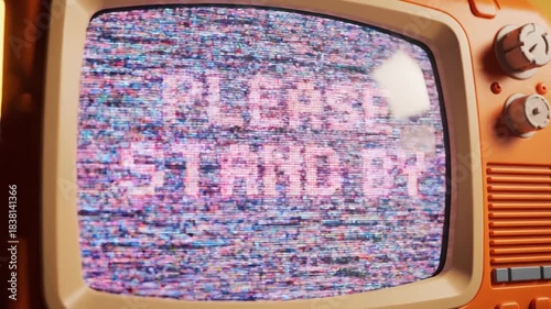 Cute cartoon retro-futuristic orange television displaying pixelated 