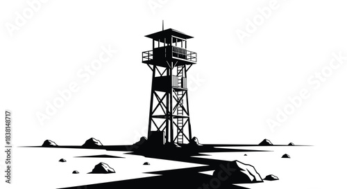 Isolated black and white silhouette of a tall wooden fire lookout tower standing guard over a desolate landscape