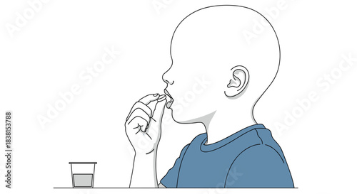 Child taking medication with glass of water on table  