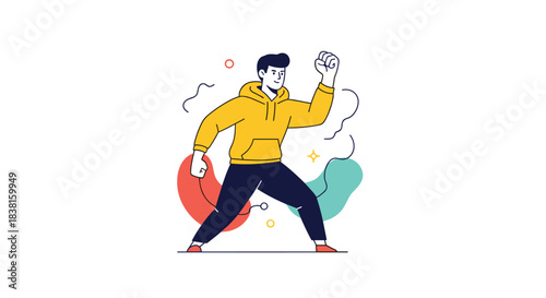 Energetic young man in a yellow hoodie raises a fist in a gesture of triumph, confidence, and determination on a white background.