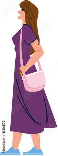 Woman walking in purple dress carrying handbag
