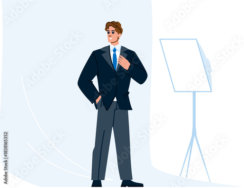 Businessman in suit preparing for studio photography session