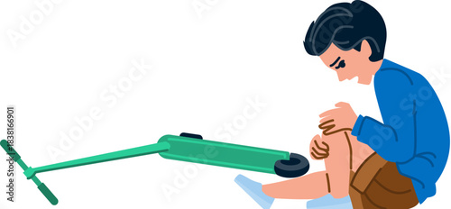Young boy falling from scooter experiencing knee pain