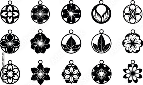Collection of black and white ornate pendant designs isolated on a white background
