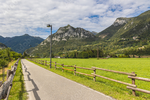 Cycling through the untouched nature of the Valsassina, along the cycle and pedestrian path that follows the Pioverna creek. A flat and safe route, surrounded by green pastures and dominated by the ma