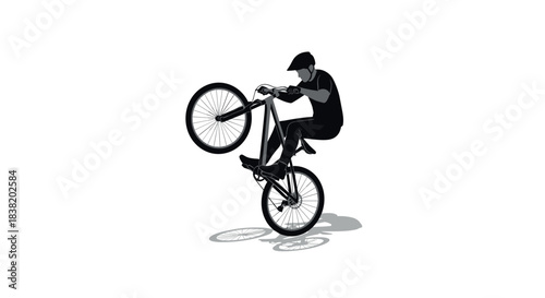 Cyclist performing wheelie in minimalist silhouette art