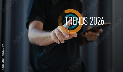 Businessman Pointing at Trends 2026 — Future Business and Technology Trend Concept