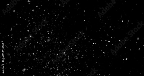 Falling snowflakes isolated on black background. Winter snow overlay texture for VFX, compositing, motion graphics and atmospheric effects
