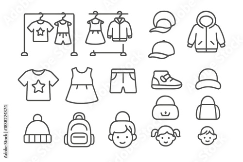 Clothes and accessories for children displayed in a simple store setup with various items on racks