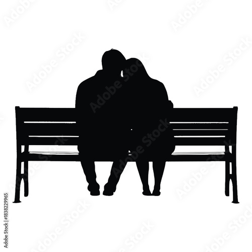 Couple sitting closely on a park bench silhouetted against a bright background