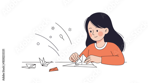 Asian female child creating origami with paper at table