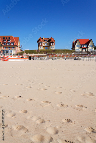 Beautiful seaside beach house on waterfront promenade at the coastal village, West Flanders, sunny summer day, De Haan, Belgium