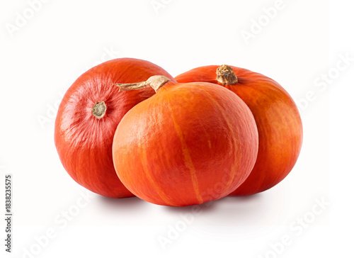 Hokkaido pumpkin isolated on a white background. Three Hokkaido pumpkins isolated on white.